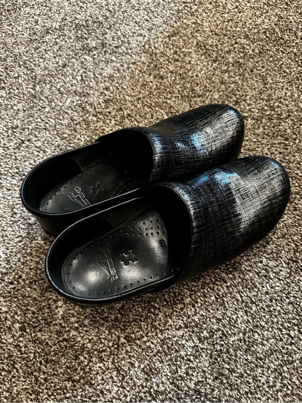 Dansko Black Textured Leather Slip-On Clogs